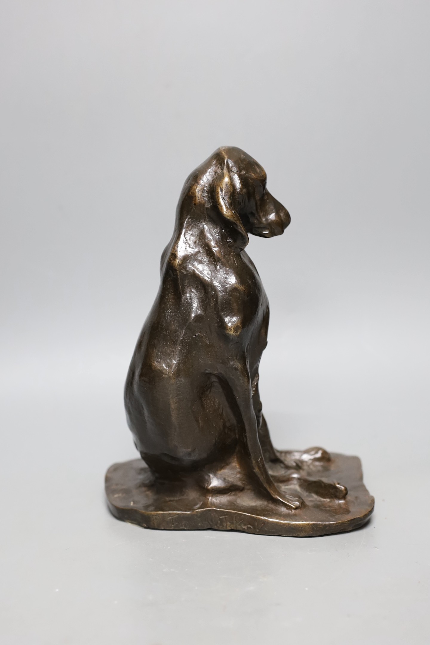 After Prince Paul Troubetzkoy (Russian 1866-1938), a bronze seated figure of a bloodhound bitch, signed. 23cm tall